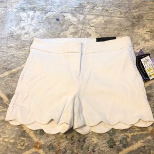 White scalloped shorts